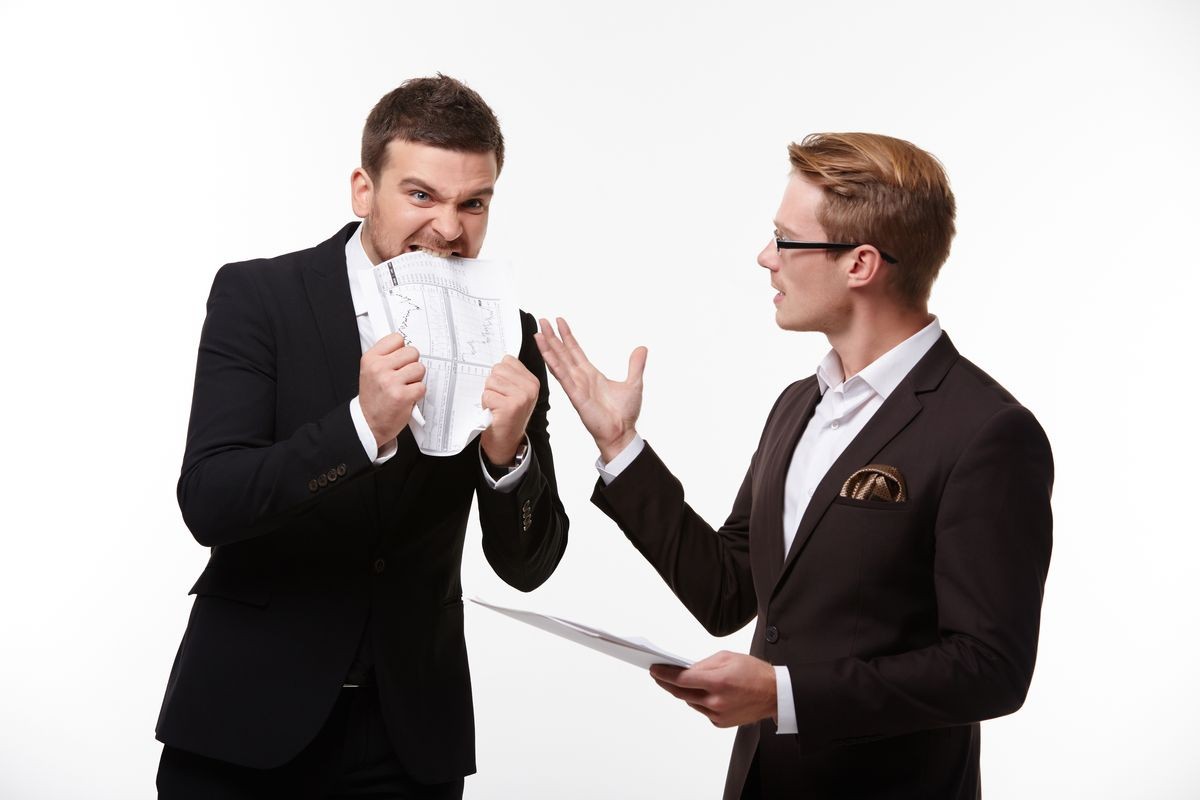 two businessmen arguing 