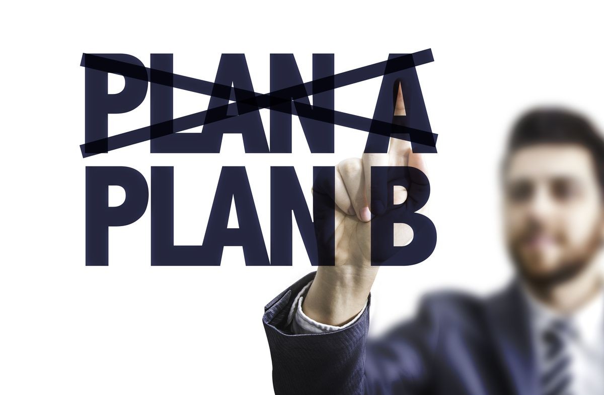Business man pointing the text: Plan A - Plan B